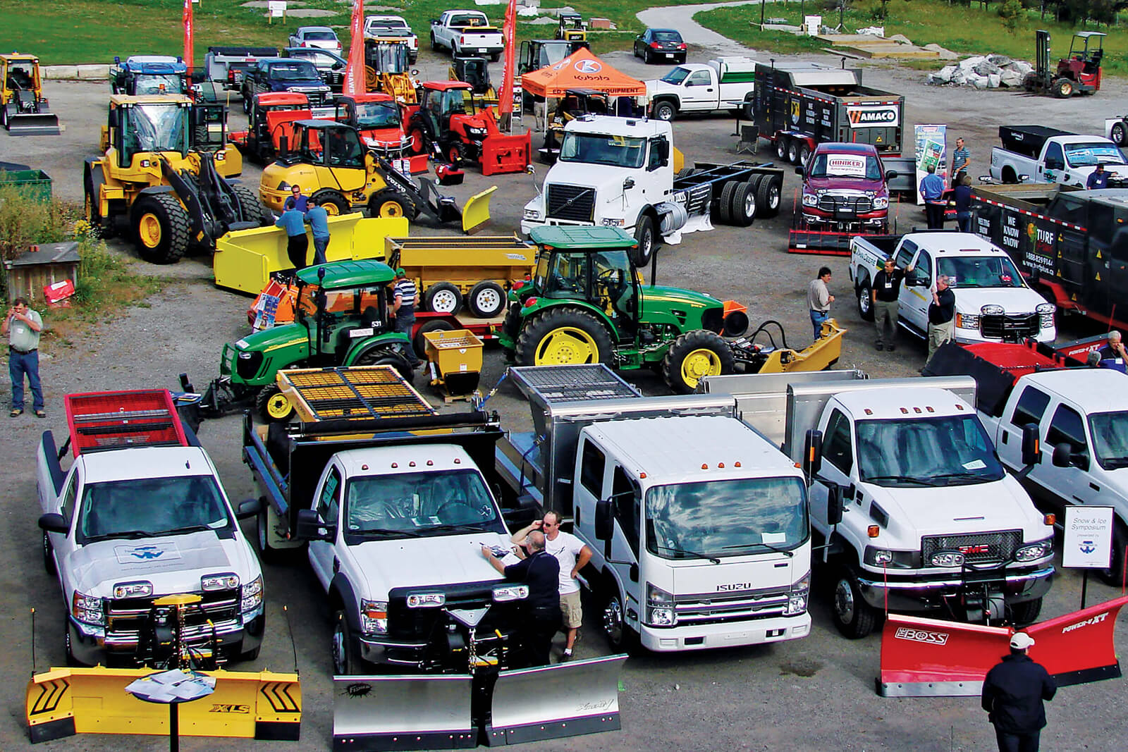 snow removal equipment at an outdoor trade show